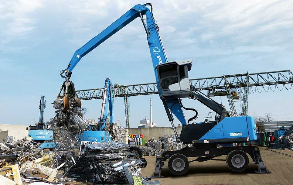 Перегружатель fuchs. Terex Fuchs MHL 350. Фукс погрузчик перегружатель. Колесный перегружатель Фукс. Погрузчик металлолома Фукс.